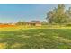 Spacious backyard with grassy lawn and mature trees at 20606 Quinn St, Orlando, FL 32833