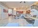 Open concept living area with kitchen, seating area, and staircase at 20606 Quinn St, Orlando, FL 32833