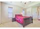 Primary bedroom with a sleigh bed, nightstand, and window blinds at 20606 Quinn St, Orlando, FL 32833