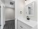 Bathroom with vanity and white quartz countertop at 43 S Kentucky Ave, Umatilla, FL 32784