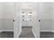 Walk-in closet and double vanity bathroom with modern finishes at 43 S Kentucky Ave, Umatilla, FL 32784