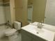 Bathroom with tub, toilet and vanity at 3480 Soho St # 101, Orlando, FL 32835
