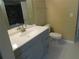 Bathroom with vanity, toilet and shower/tub combo at 3480 Soho St # 101, Orlando, FL 32835