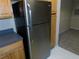 Stainless steel refrigerator in kitchen at 3480 Soho St # 101, Orlando, FL 32835