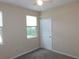 Bedroom with closet and window with blinds at 3480 Soho St # 101, Orlando, FL 32835