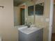 Bathroom with vanity, sink, and mirror at 3480 Soho St # 101, Orlando, FL 32835