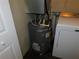 Laundry room with washer, dryer, and water heater at 3480 Soho St # 101, Orlando, FL 32835