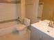 Bathroom with tub, toilet and vanity at 3480 Soho St # 101, Orlando, FL 32835