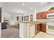 Fully equipped kitchen with modern appliances and dining area at 1370 Tuscan Terrace # 2205, Davenport, FL 33896