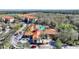 Community pool with surrounding buildings and landscaping at 1370 Tuscan Terrace # 2205, Davenport, FL 33896