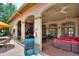 Outdoor bar and patio furniture near the pool at 1370 Tuscan Terrace # 2205, Davenport, FL 33896