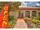 Community center with open doors and inviting landscaping at 1370 Tuscan Terrace # 2205, Davenport, FL 33896