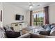 Comfortable living room with a flat-screen TV and access to a balcony at 1370 Tuscan Terrace # 2205, Davenport, FL 33896
