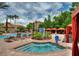 Relaxing spa tub with pool and lounge chairs nearby at 1370 Tuscan Terrace # 2205, Davenport, FL 33896