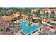 Aerial view of the community pool and surrounding buildings at 1370 Tuscan Terrace # 2205, Davenport, FL 33896