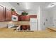 L-shaped kitchen featuring granite countertops and stainless steel appliances at 1370 Tuscan Terrace # 2205, Davenport, FL 33896