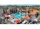 Resort-style pool with lounge chairs and cabanas at 1370 Tuscan Terrace # 2205, Davenport, FL 33896