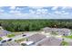 Aerial view of a house and surrounding area at 122 Blue Cypress Drive, Davenport, FL 33837