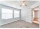 Light and airy bedroom with carpeted floors and white door at 320 Black Oak Ct # 107, Altamonte Springs, FL 32701