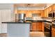 Updated kitchen with wood cabinets and granite countertops at 320 Black Oak Ct # 107, Altamonte Springs, FL 32701