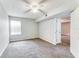 Spacious bedroom with large window and ceiling fan at 320 Black Oak Ct # 107, Altamonte Springs, FL 32701