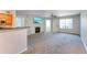Living room with fireplace and kitchen view at 320 Black Oak Ct # 107, Altamonte Springs, FL 32701