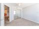 Bright bedroom with mirrored closet doors and carpet flooring at 320 Black Oak Ct # 107, Altamonte Springs, FL 32701