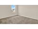 Bright bedroom with neutral walls and carpet flooring at 5385 Hayloft Dr, Apopka, FL 32712