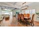 Elegant dining room featuring a wood table and chandelier at 927 Ashington Pl # 2, Orlando, FL 32804