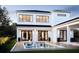 Luxury home with a modern design, featuring a pristine pool and deck at 3304 Harrison Ave, Orlando, FL 32804