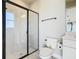 Bathroom with a walk-in shower, toilet and white vanity at 4234 Sunset Preserve Blvd, Orlando, FL 32820