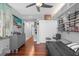 Bright bedroom with hardwood floors, city views, and built-in shelving at 322 E Central Blvd # 710, Orlando, FL 32801