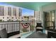 Spacious balcony with city views and comfortable seating at 322 E Central Blvd # 710, Orlando, FL 32801