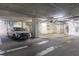 Secure parking garage with designated parking spot at 322 E Central Blvd # 710, Orlando, FL 32801
