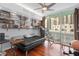 Multi-purpose bedroom with hardwood floors, a sleeper sofa, and ample storage at 322 E Central Blvd # 710, Orlando, FL 32801