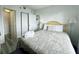 Bedroom with a queen-size bed and access to the bathroom at 6165 Carrier Dr # 3802, Orlando, FL 32819