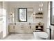 Modern bathroom with double vanity, large soaking tub, and marble floors at 3304 Harrison Ave, Orlando, FL 32804