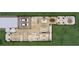 First floor plan showcasing an open concept layout with a two-car garage at 3304 Harrison Ave, Orlando, FL 32804