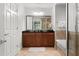 Spa-like bathroom with double vanity, soaking tub, and separate shower at 1350 Centre Court Ridge # 103, Reunion, FL 34747