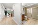 Well-appointed bathroom includes a walk-in shower and updated vanity at 1350 Centre Court Ridge # 103, Reunion, FL 34747