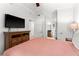 Bedroom with a king-size bed and an ensuite bathroom at 1350 Centre Court Ridge # 103, Reunion, FL 34747