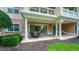 Covered patio with seating area and access to interior at 1350 Centre Court Ridge # 103, Reunion, FL 34747
