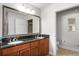 Bathroom with double vanity and granite countertop at 1350 Centre Court Ridge # 103, Reunion, FL 34747