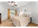 Bedroom with two twin beds and ceiling fan at 1350 Centre Court Ridge # 103, Reunion, FL 34747