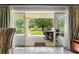 Relaxing patio view from inside the living room at 1350 Centre Court Ridge # 103, Reunion, FL 34747