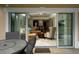 Relax on the spacious patio with views of the living area at 1350 Centre Court Ridge # 103, Reunion, FL 34747