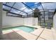 Private screened pool and patio with lounge chairs at 1568 Plunker Dr, Davenport, FL 33896