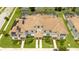 Aerial view of townhouses with solar panels at 1568 Plunker Dr, Davenport, FL 33896