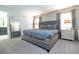 Spacious Primary bedroom with plush carpeting and large windows at 1568 Plunker Dr, Davenport, FL 33896