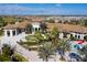 Aerial view of community with clubhouse and pool area at 1568 Plunker Dr, Davenport, FL 33896